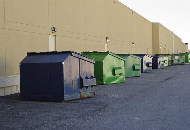 waste disposal bins at a construction zone in Albert Lea